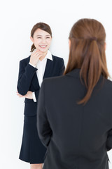 asian businesswomen talking on white background