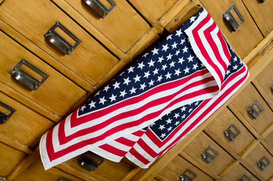 American flag out of the drawer of a cabinet
