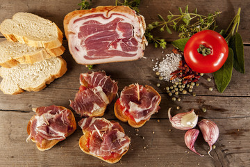 Spanish tapas presented on a wooden floor