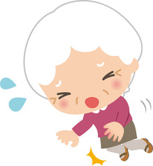 躓いて転ぶ高齢女性