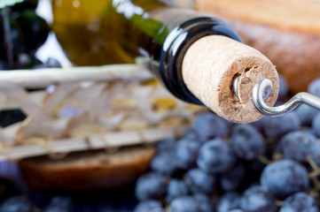 Corkscrew in the cork and the bottle