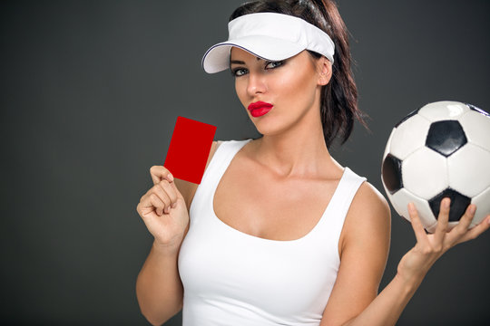 Sexy woman giving red card