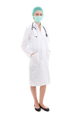 full length young woman doctor in mask and cap isolated on white