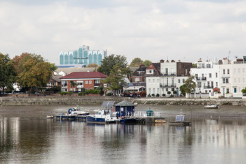 Fototapeta na wymiar Houses on the bank of Thames. London