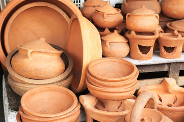 Fototapeta na wymiar brown clay pots on market