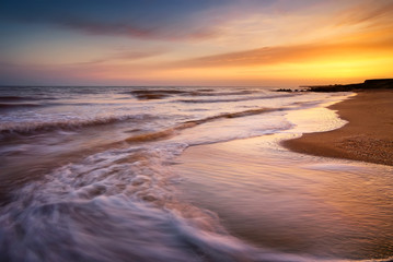 Fototapeta na wymiar Seascape during sundown. Beautiful natural seascape