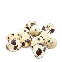 Quail eggs on white background.