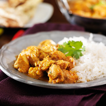 indian butter chicken curry with basmati rice