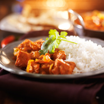 plate of indian chicken vindaloo curry with rice