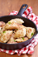 Dumplings fried with onion