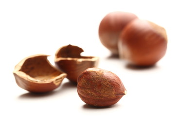 Whole and cracked hazelnuts