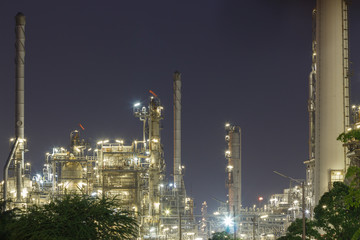 Obraz premium oil refinery industry night scene