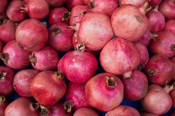 group of pomegranates.  pomegranate closeup, background