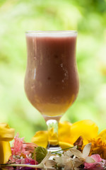 Strawberry yogurt with green background