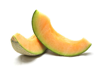 cantaloupe melon slices isolated on white background