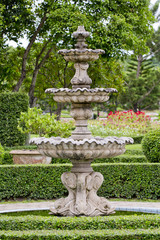 Fototapeta na wymiar A large fountain outside with Thai style Sculpture