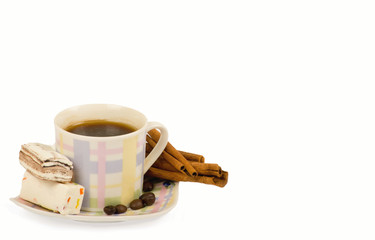 Coffee cup with sweets on white background
