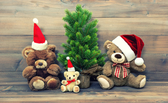 christmas decoration with vintage toys teddy bear family