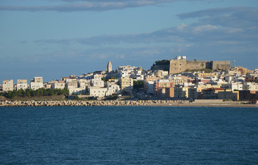 Vieste town with a medieval fortress in the background, Italy