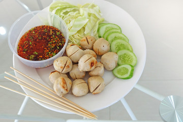 Meat ball with vegetables and sauce