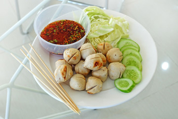 Meat ball with vegetables and sauce