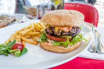 American cheese burger with Golden French fries