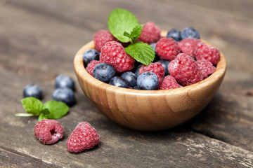Fresh berries on a wooden table