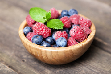 Fresh berries on a wooden table