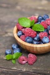Fresh berries on a wooden table