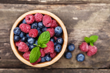 Fresh berries on a wooden table