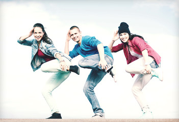group of teenagers dancing