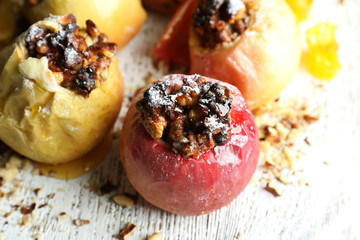 Baked apples on table close up