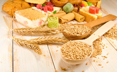 image of a glass of milk and various sweets