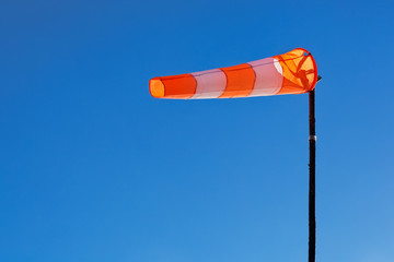 Windsock with blue sky