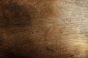 burned burlap on wood background