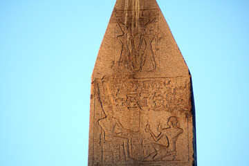Egyptian hieroglyphics carved on ancient obelisk