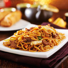 chinese beef lo mein on plate © Joshua Resnick