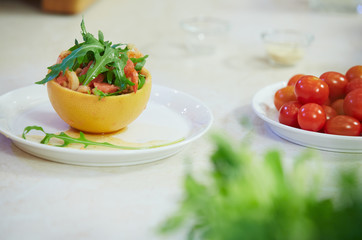 salad in grapefruit peel
