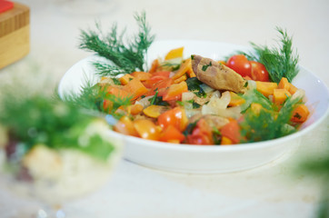 salad with sweet peppers, chicken, onion, and dill