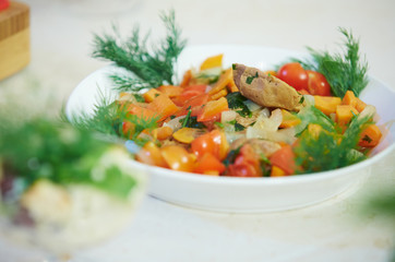 salad with sweet peppers, chicken, onion, and dill