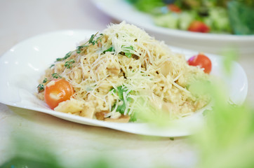 Spaghetti with cherry tomatoes and parsley