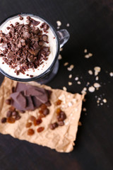 Yogurt, with chocolate cream, chopped chocolate and muesli