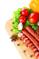 Smoked thin sausages and vegetables