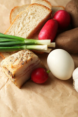 Bacon, fresh vegetables, boiled egg and bread