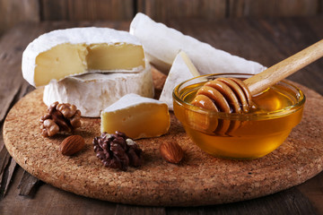 Camembert cheese, nuts, honey and bread