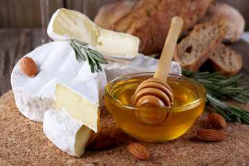 Camembert cheese, nuts, honey and bread
