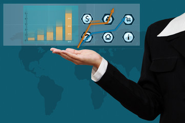 Businessman  with virtual graph and business plan. Concept of bu
