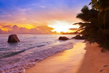 Sunset on beach Source D'Argent at Seychelles