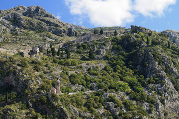 Naklejka premium Medieval citadel in the mountains. Kotor, Montenegro