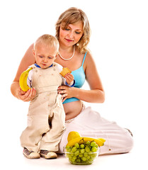 Family pregnant woman preparing food .
